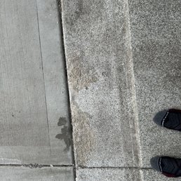 Peeling and crumbling concrete coating. Peeling and crumbling concrete coating.