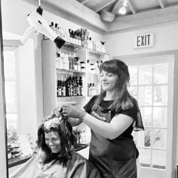 James Geidner Hair Studio - Victoria working on a guest.