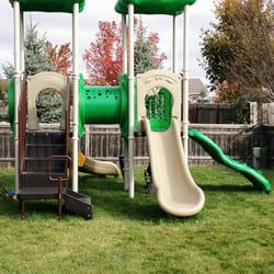 Dickelman Childcare Service - Outdoor playground at DCSI.
Lots of room to run, climb, hide & explore.