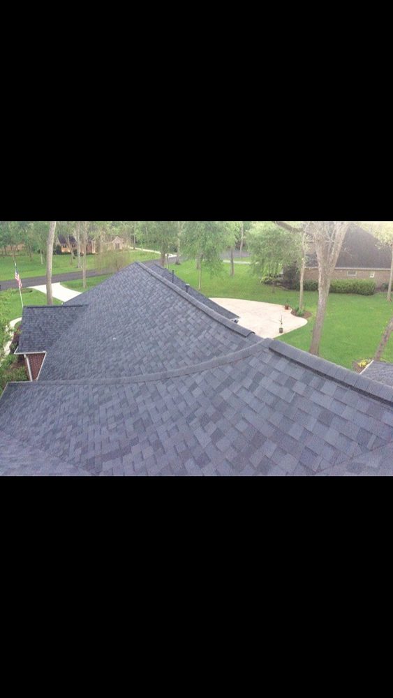 Slide of Kennedy Roofing & Exteriors