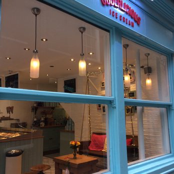 Udderlicious - Swing Couch inside - Comfortable and adds a fun touch. - Ice Cream & Frozen Yogurt Near Me - London, XGL Udderlicious - Swing Couch inside - Comfortable and adds a fun touch. - Ice Cream & Frozen Yogurt Near Me - London, XGL