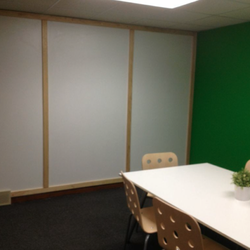 inTANDEM workspace - Our small conference room features a whiteboard wall and plenty of room for up to six to spread out.