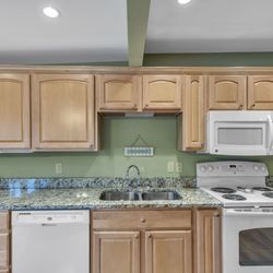 Cynthia Trapp with Cressy & Everett Real Estate, REALTOR - Lake Michigan Beach access house near Coloma: you'll love the huge kitchen with granite and custom hardwood cabinets. 269-849-5947 for  info