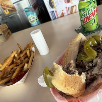 Tony's Chicago Beef - Chicago beef sandwich with sweet peppers and homemade fries!!! Sorry took a bite before the picture lol - Burgers Near Me - Sarasota, Florida Tony's Chicago Beef - Chicago beef sandwich with sweet peppers and homemade fries!!! Sorry took a bite before the picture lol - Burgers Near Me - Sarasota, Florida