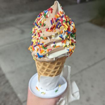Turbo Cone - Chocolate and vanilla twist with rainbow sprinkles - Ice Cream & Frozen Yogurt Near Me - Charleston, South Carolina Turbo Cone - Chocolate and vanilla twist with rainbow sprinkles - Ice Cream & Frozen Yogurt Near Me - Charleston, South Carolina