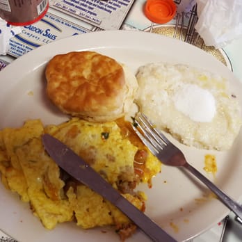T-Coon's - Crawfish omelette with biscuit and grits. - Breakfast & Brunch Near Me - Lafayette, Louisiana T-Coon's - Crawfish omelette with biscuit and grits. - Breakfast & Brunch Near Me - Lafayette, Louisiana