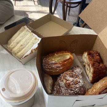 Black Walnut Bakery - Coconut pineapple cake, latte, monkey bread, pear pastry, almond croissant - Bakeries Near Me - Minneapolis, Minnesota Black Walnut Bakery - Coconut pineapple cake, latte, monkey bread, pear pastry, almond croissant - Bakeries Near Me - Minneapolis, Minnesota