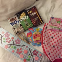 Window stickers, Pocky snacks, garment laundry bag, calculator and nail clippers