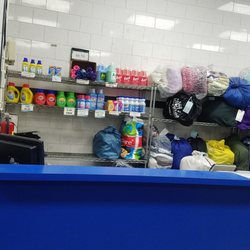 Sky Blue Laundrymat - Laundry detergent and other items.
