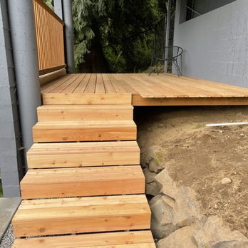 Cleo Landscaping - steps leading up to a deck - Landscaping Near Me