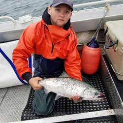 Liebert's Guide Service - Captain Brian holding one of my throw backs and explaining why it's not a keeper.