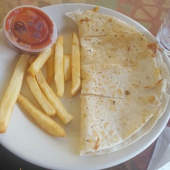 Taco Shore - My 5 year olds child quesadilla with the sad portion of fries. - Mexican Near Me - Long Beach, California Taco Shore - My 5 year olds child quesadilla with the sad portion of fries. - Mexican Near Me - Long Beach, California