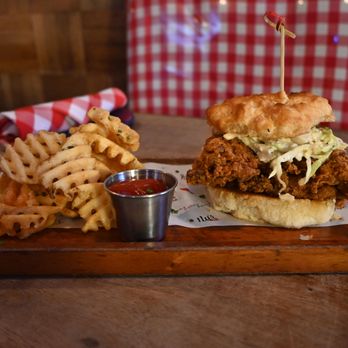 Sally's Southern - Fried Chicken Biscuit - Buttermilk Biscuit, Boneless Chicken Thigh, Coleslaw, Pickle Aioli - Southern Near Me - Staten Island, New York Sally's Southern - Fried Chicken Biscuit - Buttermilk Biscuit, Boneless Chicken Thigh, Coleslaw, Pickle Aioli - Southern Near Me - Staten Island, New York