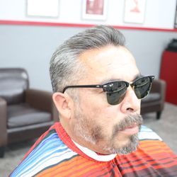 Big Boy's Barber Shop - Slick back with a #1 guard on the sides