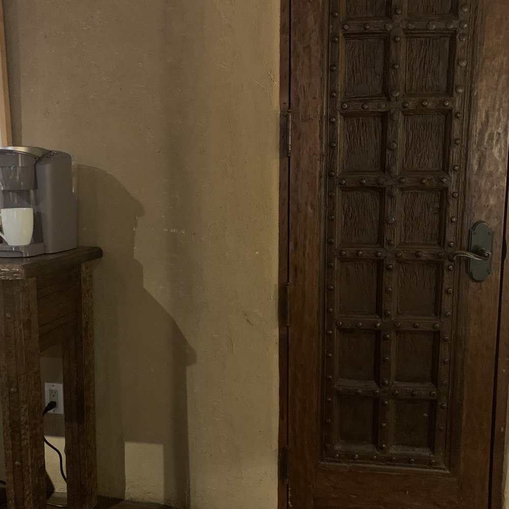 Vanessie - a door and a table in a room - Bars Near Me - Santa Fe, New Mexico Vanessie - a door and a table in a room - Bars Near Me - Santa Fe, New Mexico