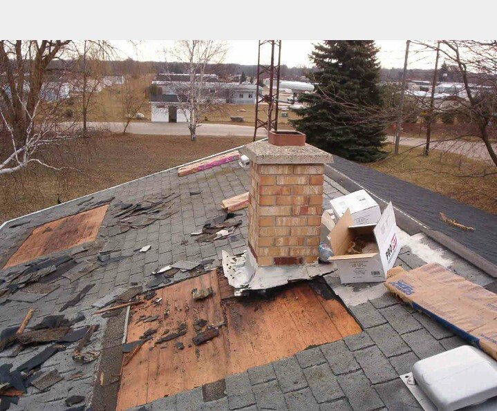 Slide of Roy's Roof Repair