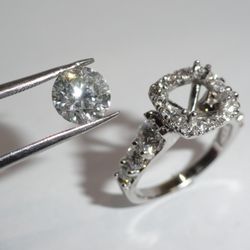 My Diamond Jewelry Store - We changed the HALO in our stock ring to fit this 3ct. round diamond...