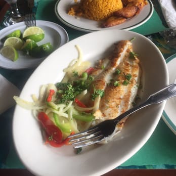 La Minutera Seafood Restaurant - Grilled grouper. Yellow rice in the background. - Seafood Near Me - Hialeah, Florida