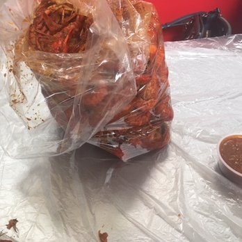 Bon Crawfish Hut - 2 pounds of crawfish and a side of sauce for dipping from my favorite crawfish place! - Seafood Near Me - Grand Prairie, Texas