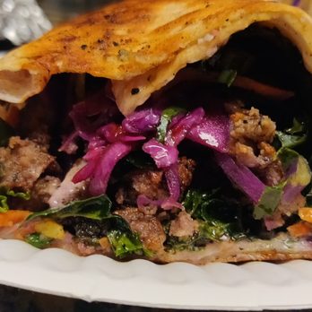 Royal Egyptian Cuisine - a pita filled with meat and vegetables - Food Trucks Near Me - Berkeley, California