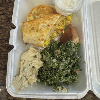 Pesto Cafe and grill - Chicken Caesar Wrap with tabbouleh and hummus - Sandwiches Near Me - Miami, Florida Pesto Cafe and grill - Chicken Caesar Wrap with tabbouleh and hummus - Sandwiches Near Me - Miami, Florida