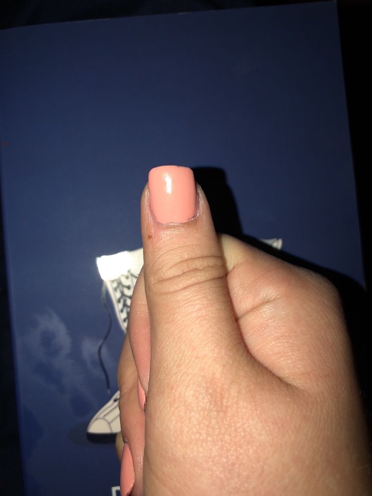 Deluxe Nails And Spa Logo