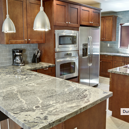 Dunrite Design Group - a kitchen with granite countertops - General Contractors Near Me - Staten Island, New York