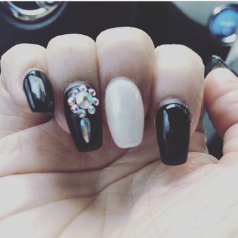 Aura Nail Place - Some nails look like they still need a fill, while others don't.  The middle (white nail) is crooked and really thick - Waxing Near Me - Orange, California