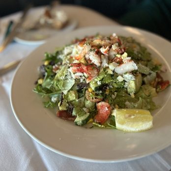 Ocean Prime - a salad on a white plate - Seafood Near Me - Phoenix, Arizona Ocean Prime - a salad on a white plate - Seafood Near Me - Phoenix, Arizona