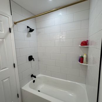 Garvera Custom Renovations - a bathtub and shower - General Contractors Near Me Garvera Custom Renovations - a bathtub and shower - General Contractors Near Me