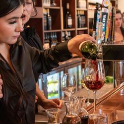 D.H. Lescombes Winery & Bistro - Cottonwood Albuquerque - Pouring wine at our bar