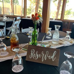 Christes of Genesee - Dining room with our linens and the bride's added touches.