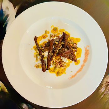 Confluence - harissa carrots - walnut, labne, raisin, pepita, fennel pollen, carrot-lime vin. - New American Near Me - Carefree, Arizona