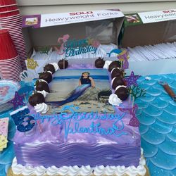 Renato's Pastry Shoppe - Vanilla/Chocolate cake, strawberry and banana fillings/chocolate strawberries