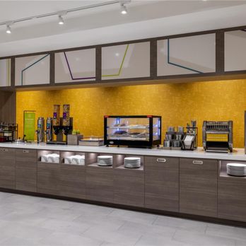 Home2 Suites by Hilton Ames - Breakfast Area - Hotels Near Me - Ames, Iowa Home2 Suites by Hilton Ames - Breakfast Area - Hotels Near Me - Ames, Iowa