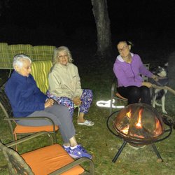 The Purple Chef's House - Sitting by the fire pit on a cool summer evening. we had Smore's and roasted potatoes