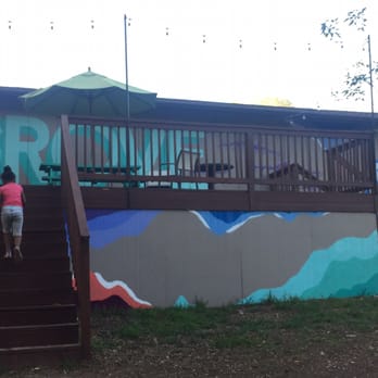The Grove Apartments - New mural in the dog park painted by the residents. - Apartments Near Me - Austin, Texas