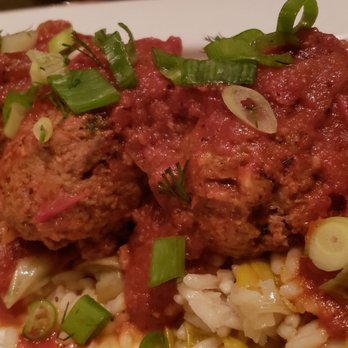 Yefsi Estiatorio - SOUTZOUKAKIA Greek Meatballs with Fresh Herbs in a Light Tomato Sauce Served over Rice - Greek Near Me - New York, New York Yefsi Estiatorio - SOUTZOUKAKIA Greek Meatballs with Fresh Herbs in a Light Tomato Sauce Served over Rice - Greek Near Me - New York, New York