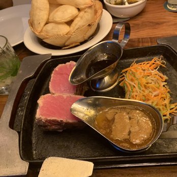 Cambalache - Tuna steak and soufflé potatoes - Argentine Near Me - Cancún, ROO Cambalache - Tuna steak and soufflé potatoes - Argentine Near Me - Cancún, ROO
