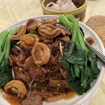 Koi Palace - Beef noodles with 711. Braised Abalone Over Beef Chow Fun - Dim Sum Near Me - Milpitas, California Koi Palace - Beef noodles with 711. Braised Abalone Over Beef Chow Fun - Dim Sum Near Me - Milpitas, California