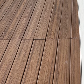 HPS Construction Services - a close up of a deck - General Contractors Near Me