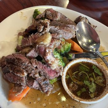 Naha Thai Restaurant - crying tiger - Thai Near Me - Sugar Land, Texas Naha Thai Restaurant - crying tiger - Thai Near Me - Sugar Land, Texas