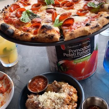 Grana - Peroni pizza and garlic park wings. Banana drink making an appearance in the back - Italian Near Me - Atlanta, Georgia Grana - Peroni pizza and garlic park wings. Banana drink making an appearance in the back - Italian Near Me - Atlanta, Georgia