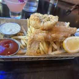 Fish and chips. Wonderful cocktail. Fish and chips. Wonderful cocktail.