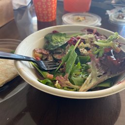 Salad made with spinach, beets, cucumbers, feta cheese and spicy chicken. Salad made with spinach, beets, cucumbers, feta cheese and spicy chicken.