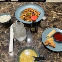 China Inn Cafe 7 - Steam rice, egg drop soup, Kung Pao chicken, small skinny egg roll, and fried crab puff