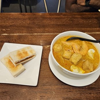 Ipoh Kopitiam - Kaya toast with butter ($5.25) and Singapore curry laksa ($15.95) - Malaysian Near Me - Alhambra, California
