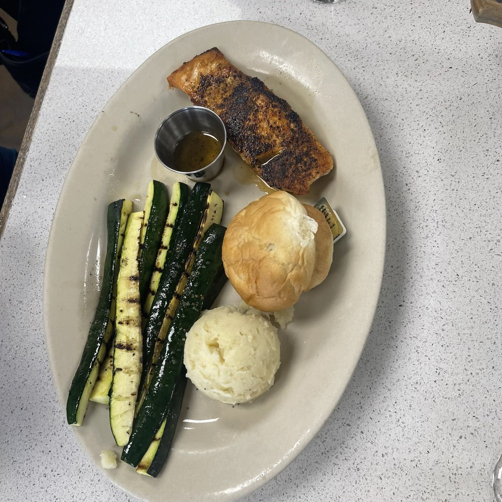 Asparagus, mashed potatoes, salmon and roll.