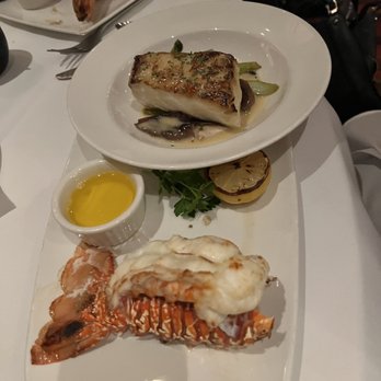 The Capital Grille - Pan-Seared Sea Bass with Shiitake Mushrooms, Asparagus and Miso Butter - Steakhouses Near Me - Schaumburg, Illinois The Capital Grille - Pan-Seared Sea Bass with Shiitake Mushrooms, Asparagus and Miso Butter - Steakhouses Near Me - Schaumburg, Illinois