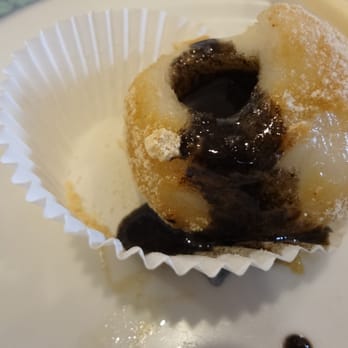 Great Eastern Restaurant - Black sesame ball (post-bitten) oozing with hot sesame filling. - Dim Sum Near Me - San Francisco, California Great Eastern Restaurant - Black sesame ball (post-bitten) oozing with hot sesame filling. - Dim Sum Near Me - San Francisco, California